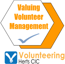 Accreditation button reads: Valuing Volunteer Management, Volunteering Herts CIC